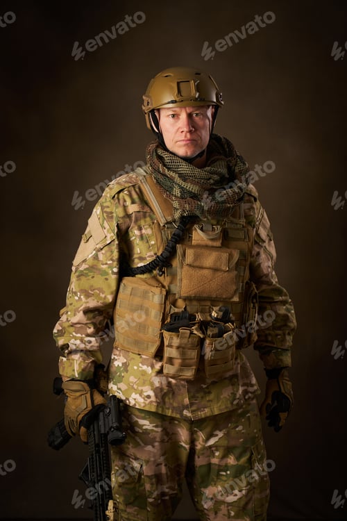 Preview: Soldier Portrait in Camouflage Gear Holding Rifle