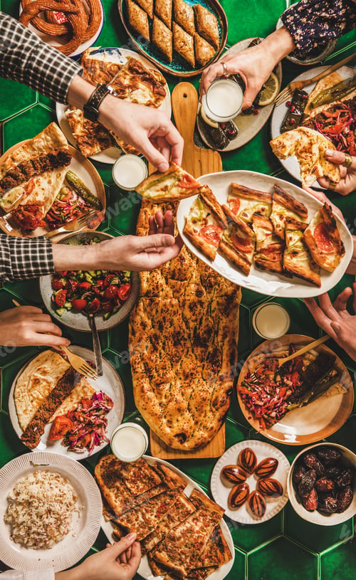Preview: Muslim traditional Ramadan iftar family dinner table with Turkish cuisine