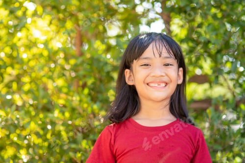 Preview: little girl showing her broken milk teeth