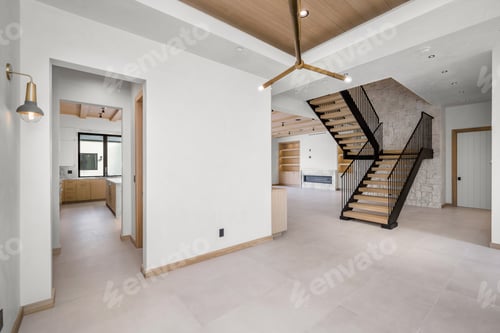 Aperçu: a modern house with an open floor plan and stairways
