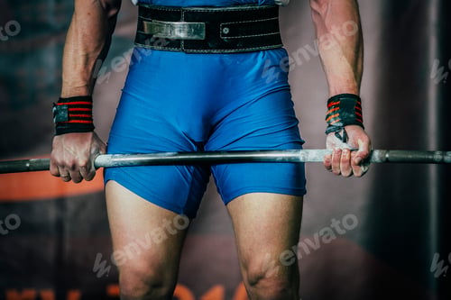 Preview: Man powerlifter and barbell