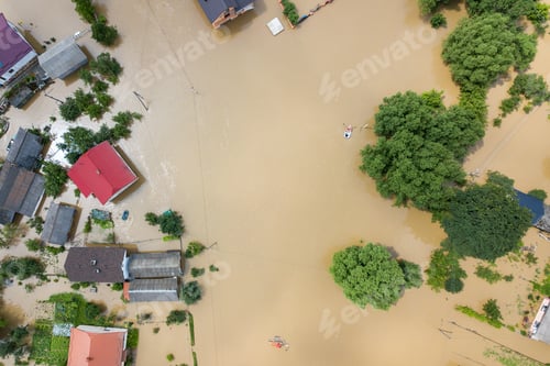 Preview: Aerial view of flooded houses with dirty water of Dnister river in Halych town, western Ukraine.
