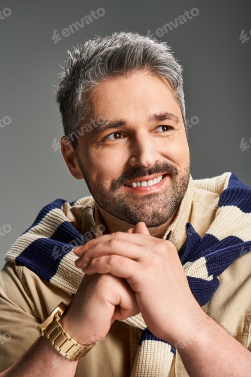 Preview: Stylish man with bristle smiles confidently in a modern fashion studio setting