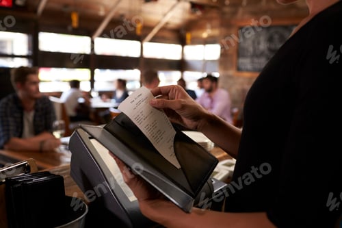 Preview: Preparing the bill at a restaurant to be taken to a table