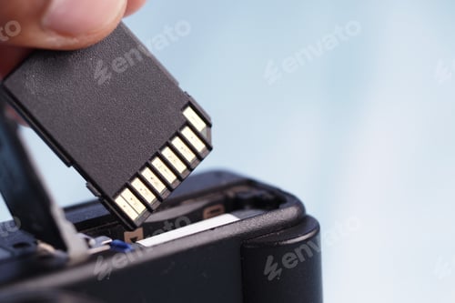 Preview: Removing a memory card from a digital camera for data transfer