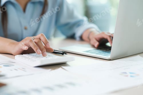 Preview: Accountant or banker calculate the cash bill.