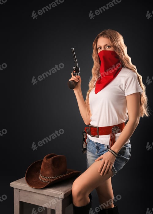 Preview: Wild cowboy girl with gun closeup