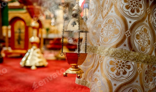 Preview: The priest's incense in a hangs in the Orthodox Church