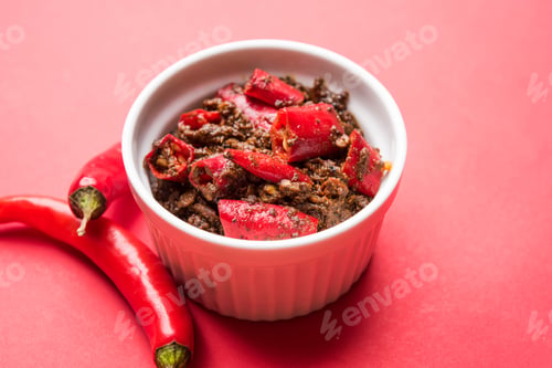 Spicy Red Chili Pickle in a White Bowl