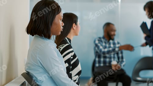 Preview: African american woman waiting to receive cv and attend job interview