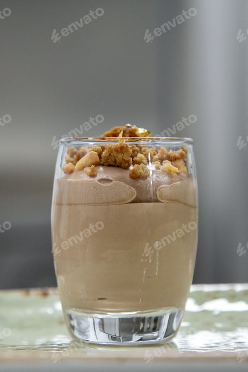 Preview: chocolate mousse in a glass with nuts