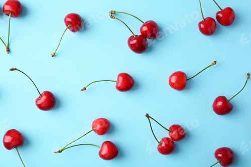 Preview: Ripe red cherries on color background, top view