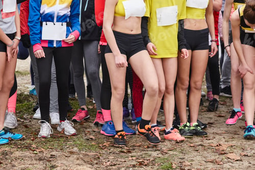 Preview: Young female atheletes ready to run. Start line. Athleticism