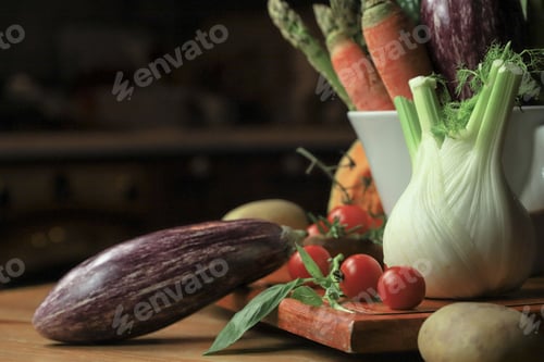 Preview: rustic composition of vegetables on wooden table and cutting board with black background