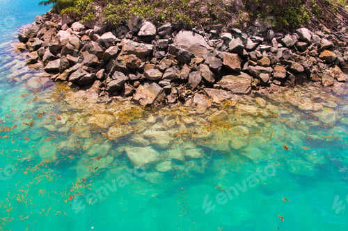 Preview: Turquoise exotic lagoon with big stones at Seychelles