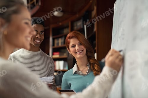 Preview: Students watching classmate solving math on whiteboard
