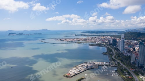 Preview: Aerial view of a harbor and modern high-rise buildings across the shoreline. Panama City.