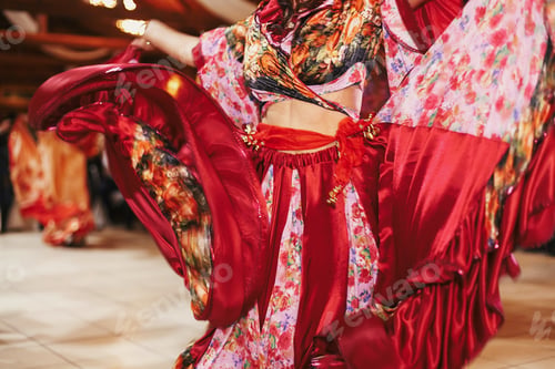 Preview: Beautiful gypsy girls dancing in traditional floral dress