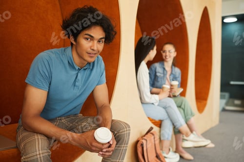 Preview: Smiling dark-skinned boy with coffee cup