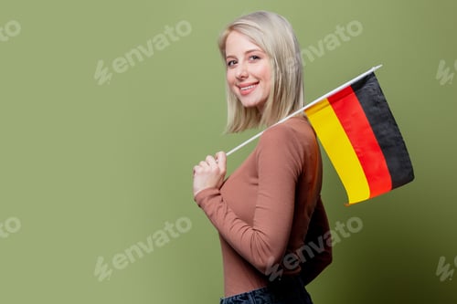 Preview: Beautiful woman with flag of Germany