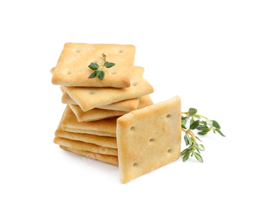 Preview: Tasty salty crackers with thyme isolated on white