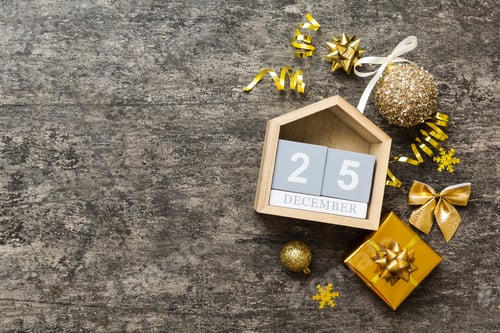 Preview: Christmas calendar 25 december. Christmas gift, fir branches, pine cones. Flat lay,