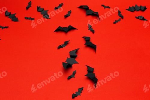Preview: halloween and decoration concept - paper bats flying