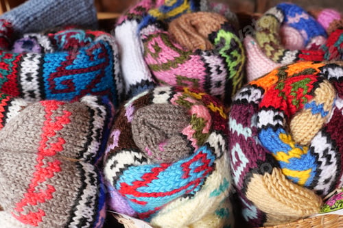 Preview: Colorful HandKnitted Yarn Rolls with Intricate Patterns Collection