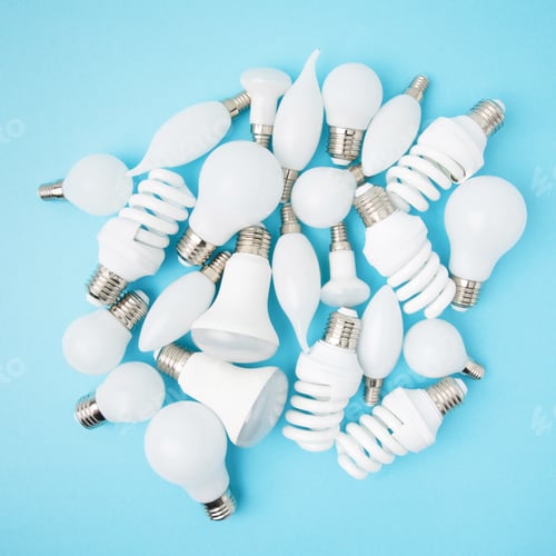 Preview: top view of different white lamps isolated on blue