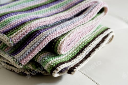 Preview: Knitting striped rug with white, purple, green and pink stripes