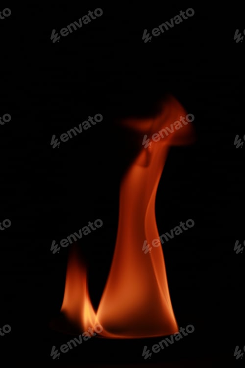 Preview: Vertical shot of flames isolated on a black background for textures