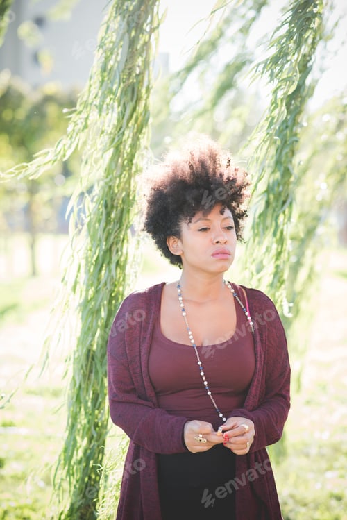Preview: beautiful black curly hair african woman
