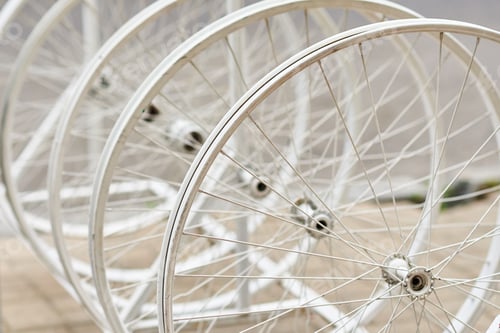 Preview: Bicycle wheels with spokes in a perspective as decor