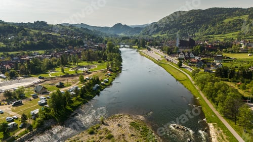 Preview: Szczawnica townscape and Dunajec River bends. Aerial drone view at springtime