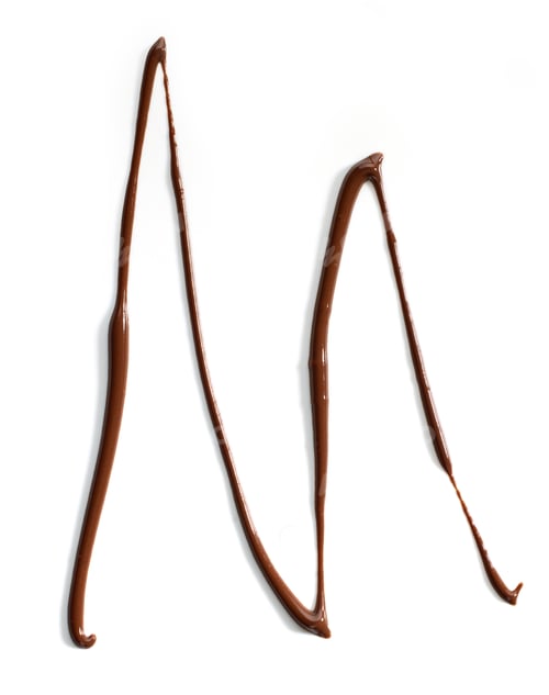 Preview: melted chocolate on white background