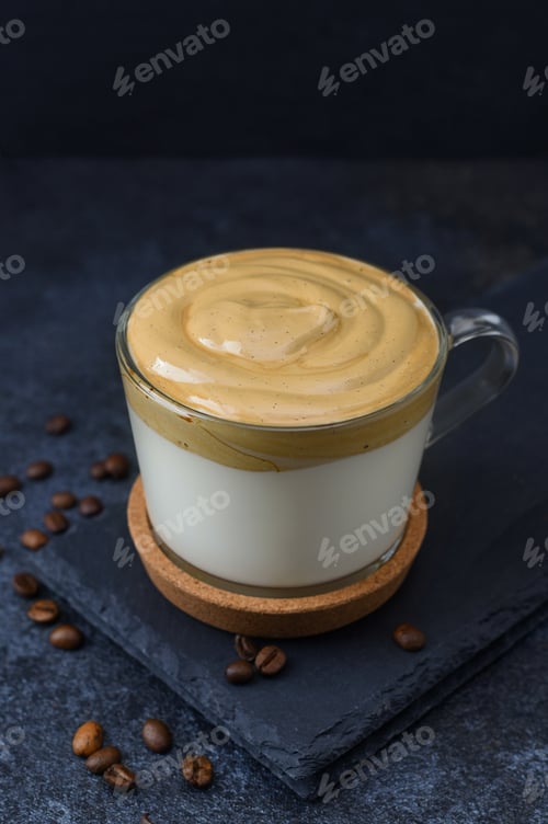 Preview: Dalgona coffee in glass cap on dark background.