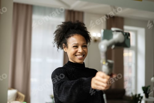 Preview: woman blogger uses phone video call communication in social network