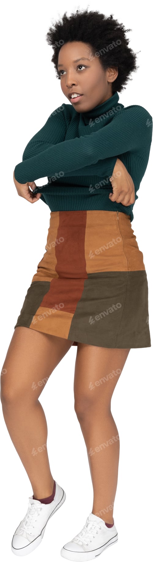 Vista previa: a woman in a brown skirt and a green sweater