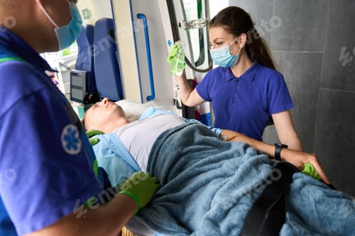 Preview: Patient, on special gurney, is moved from ambulance to emergency room