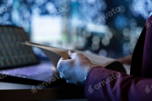 Preview: Businessman reading monthly accounting documents to ensure development