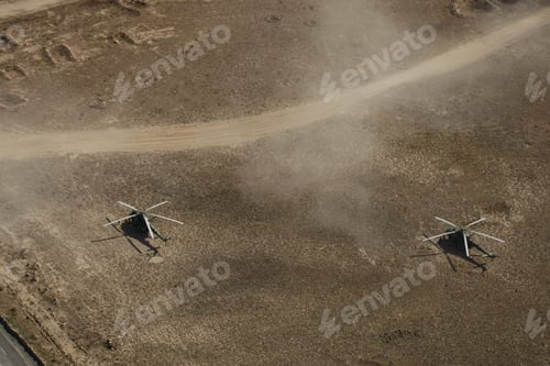 Preview: Aerial shot of two helicopters flying in the sky