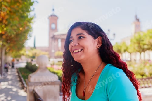 Preview: Plaza de Cervantes in Alcala de Henares tourism heritage. Hispanic mid-female journey confident
