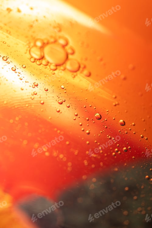 Preview: Oil in water, abstract background in yellow and red color tones