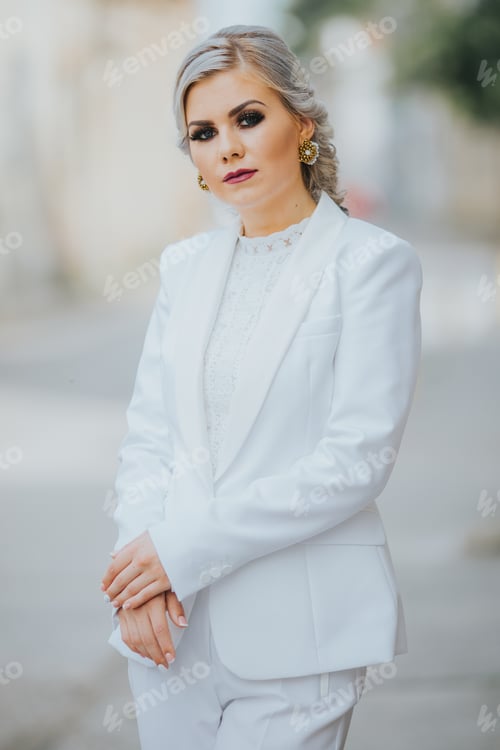 Preview: Outdoor portrait of a young girl during a sunny day