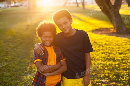Preview: Portrait of two brothers in park
