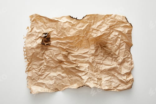 Preview: top view of empty beige crumpled and burnt vintage paper on white background