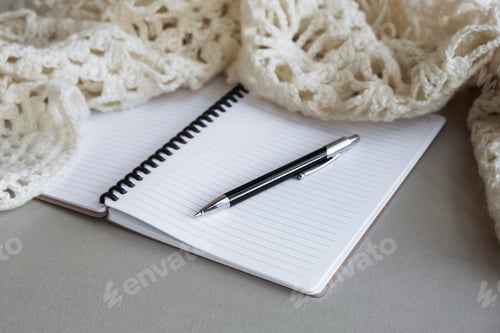 Preview: Selective focus table. Businessman hand write notebook, mobile phone, laptop