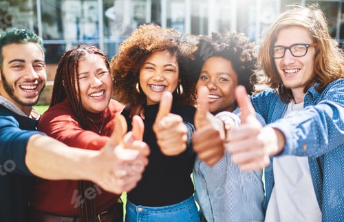 Preview: Cropped portrait of a diverse group of college friends giving thumbs up while standing outside