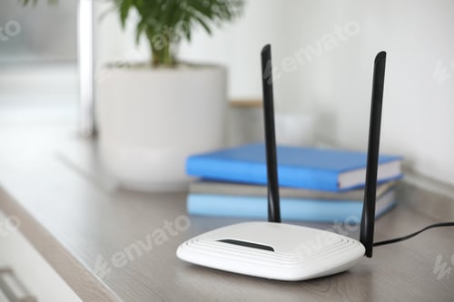 Preview: Modern Wi-Fi router indoors. Space for text