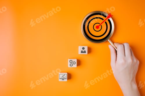 Preview: Magnifying glass with business target goal icons for increasing
